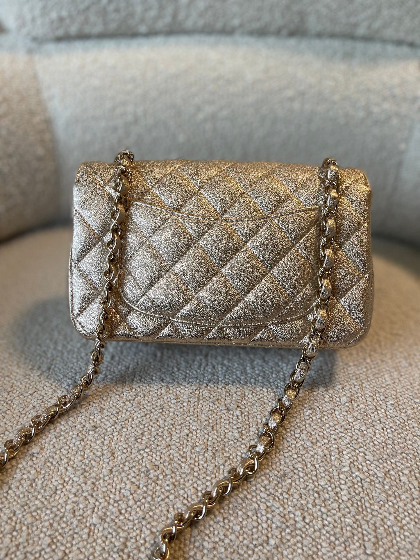 21P GOLD METALLIC CAVIAR QUILTED MINI RECTANGULAR SINGLE FLAP LIGHT GOLD HARDWARE