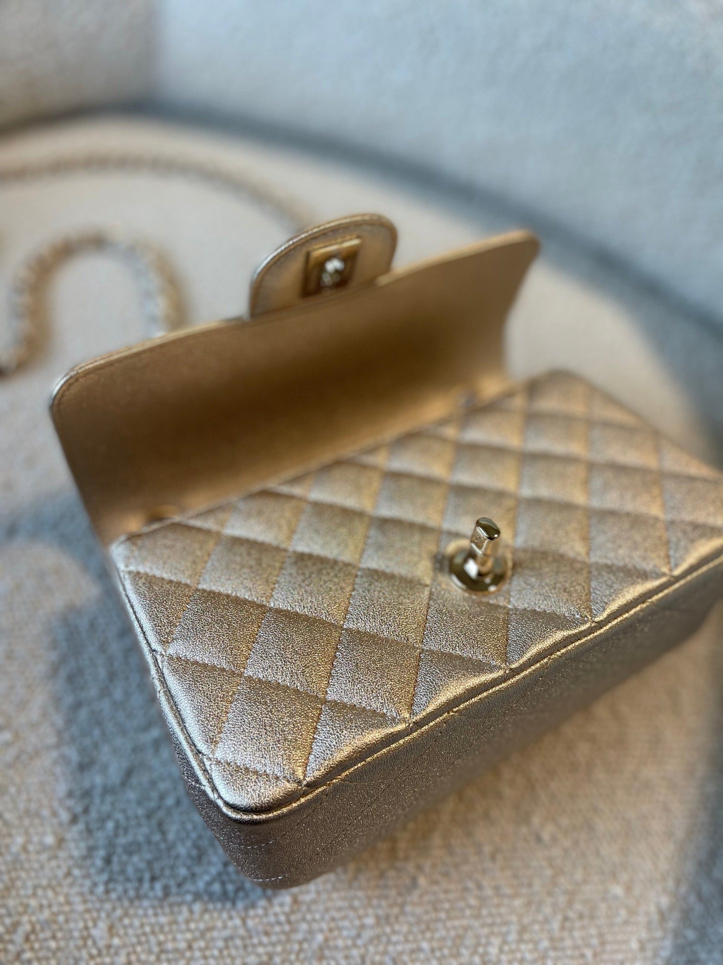 21P GOLD METALLIC CAVIAR QUILTED MINI RECTANGULAR SINGLE FLAP LIGHT GOLD HARDWARE