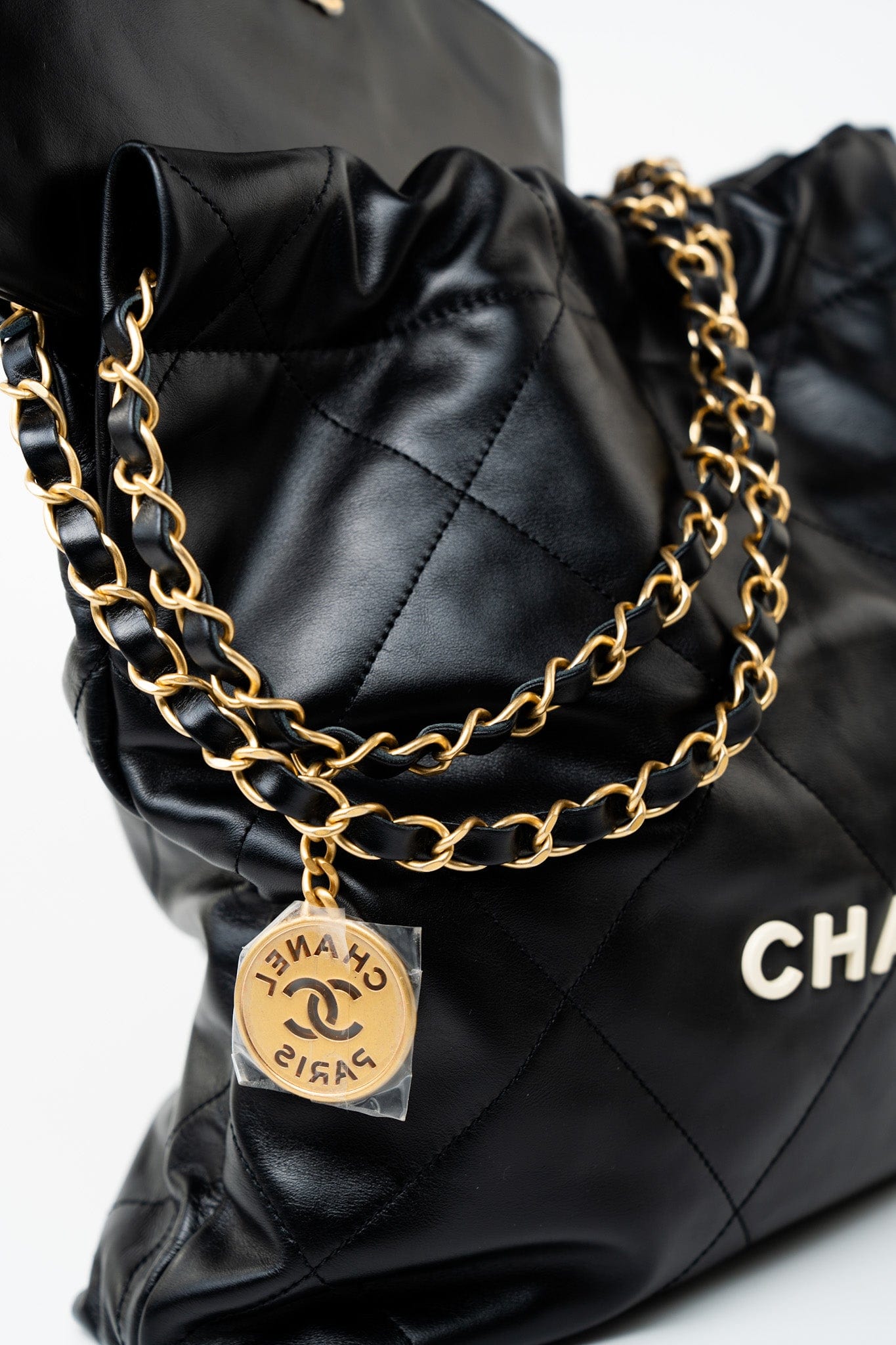 22S Black Calfskin Quilted 22 Drawstring Bag Small Antique Gold Hardware