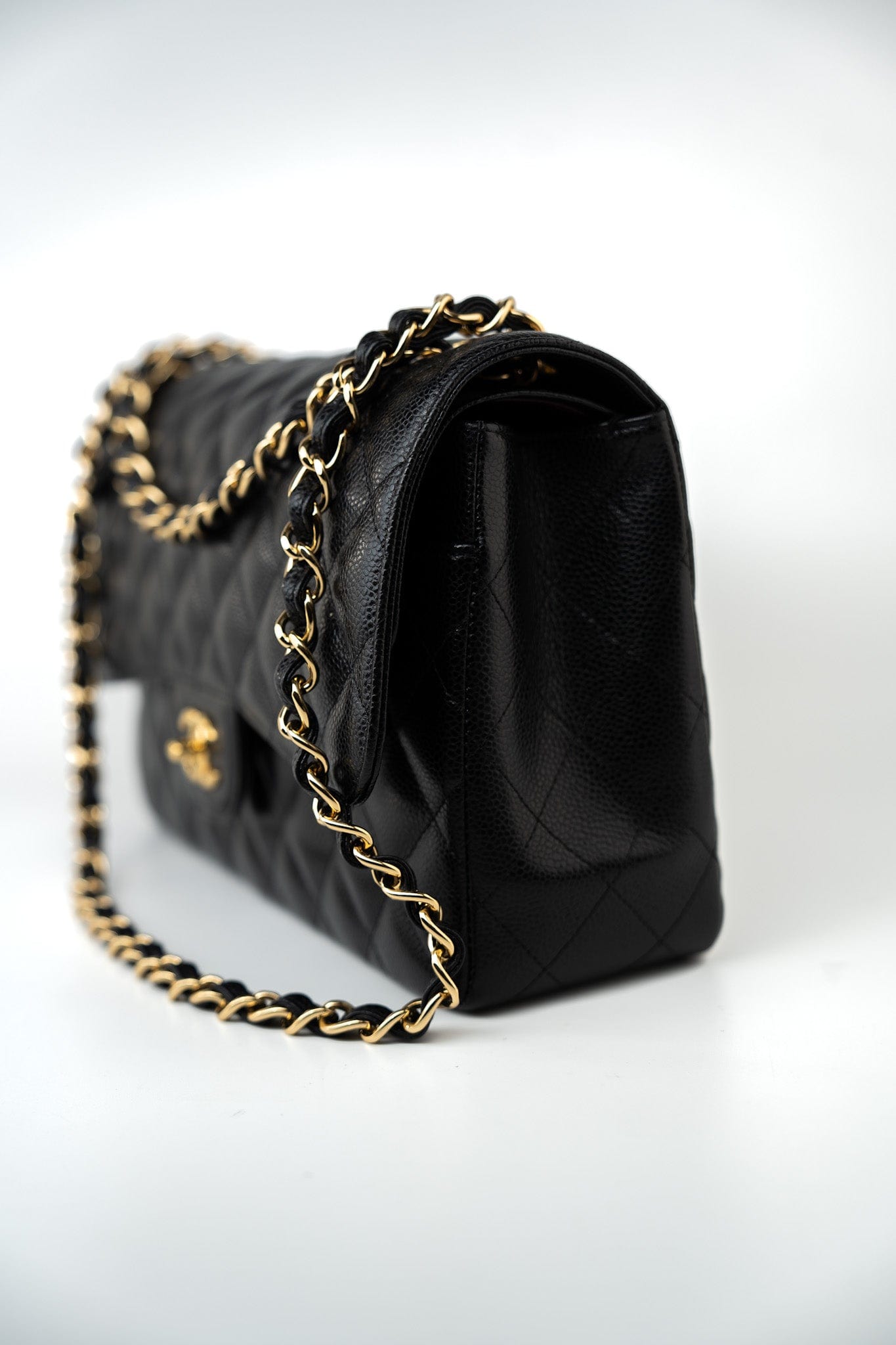 Black Caviar Quilted Jumbo Classic Flap Gold Hardware