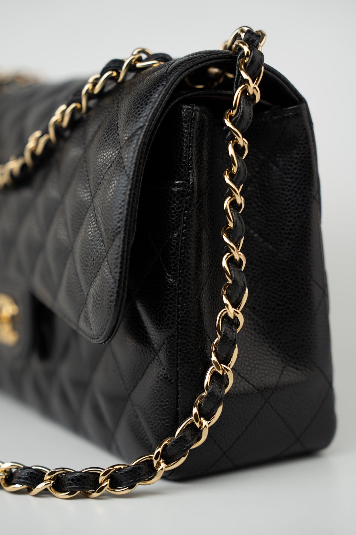 Black Caviar Quilted Jumbo Classic Flap Gold Hardware
