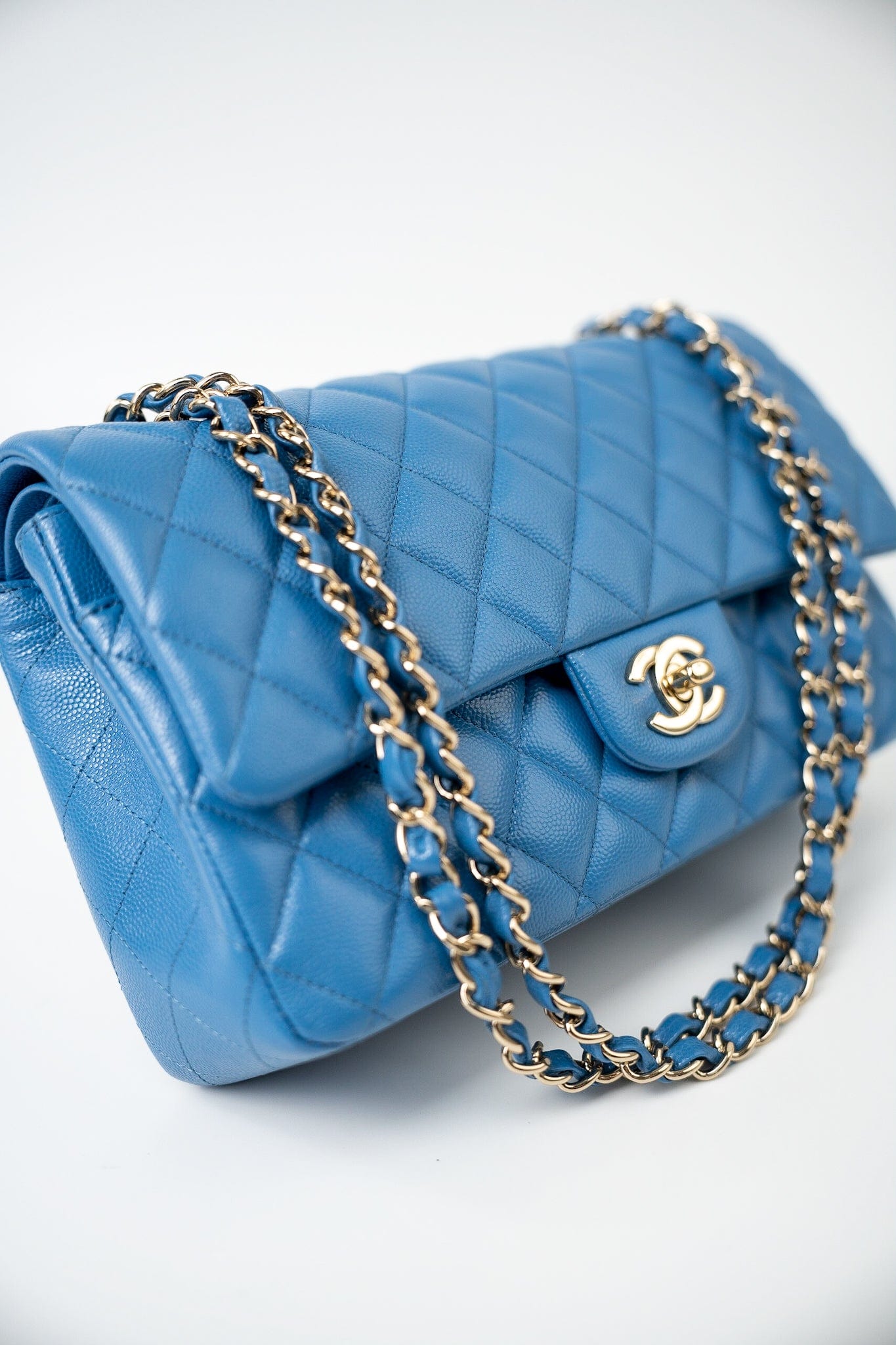 20S Blue Caviar Quilted Classic Flap Medium Light Gold Hardware