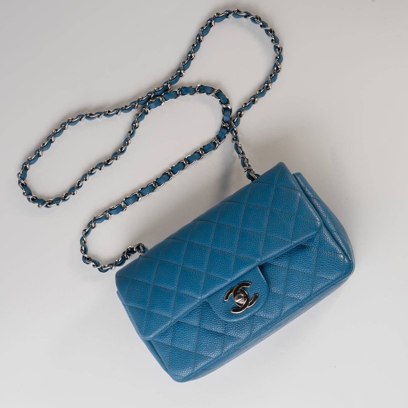BLUE MINI RECTANGULAR CAVIAR QUILTED SINGLE FLAP SILVER HARDWARE