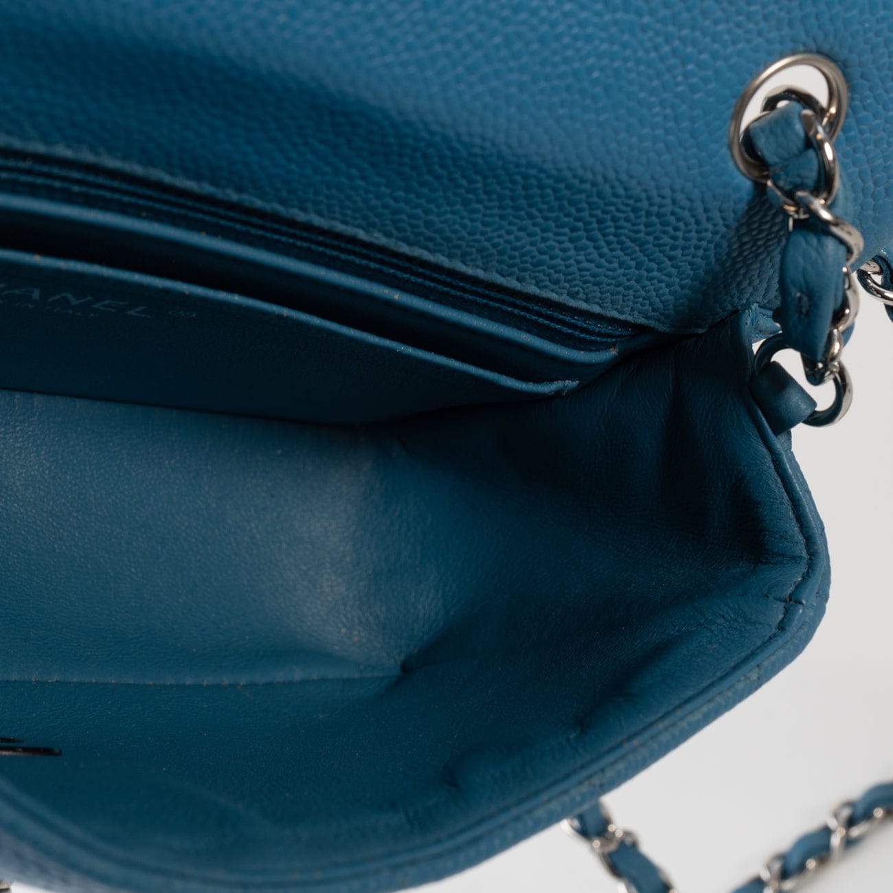 BLUE MINI RECTANGULAR CAVIAR QUILTED SINGLE FLAP SILVER HARDWARE