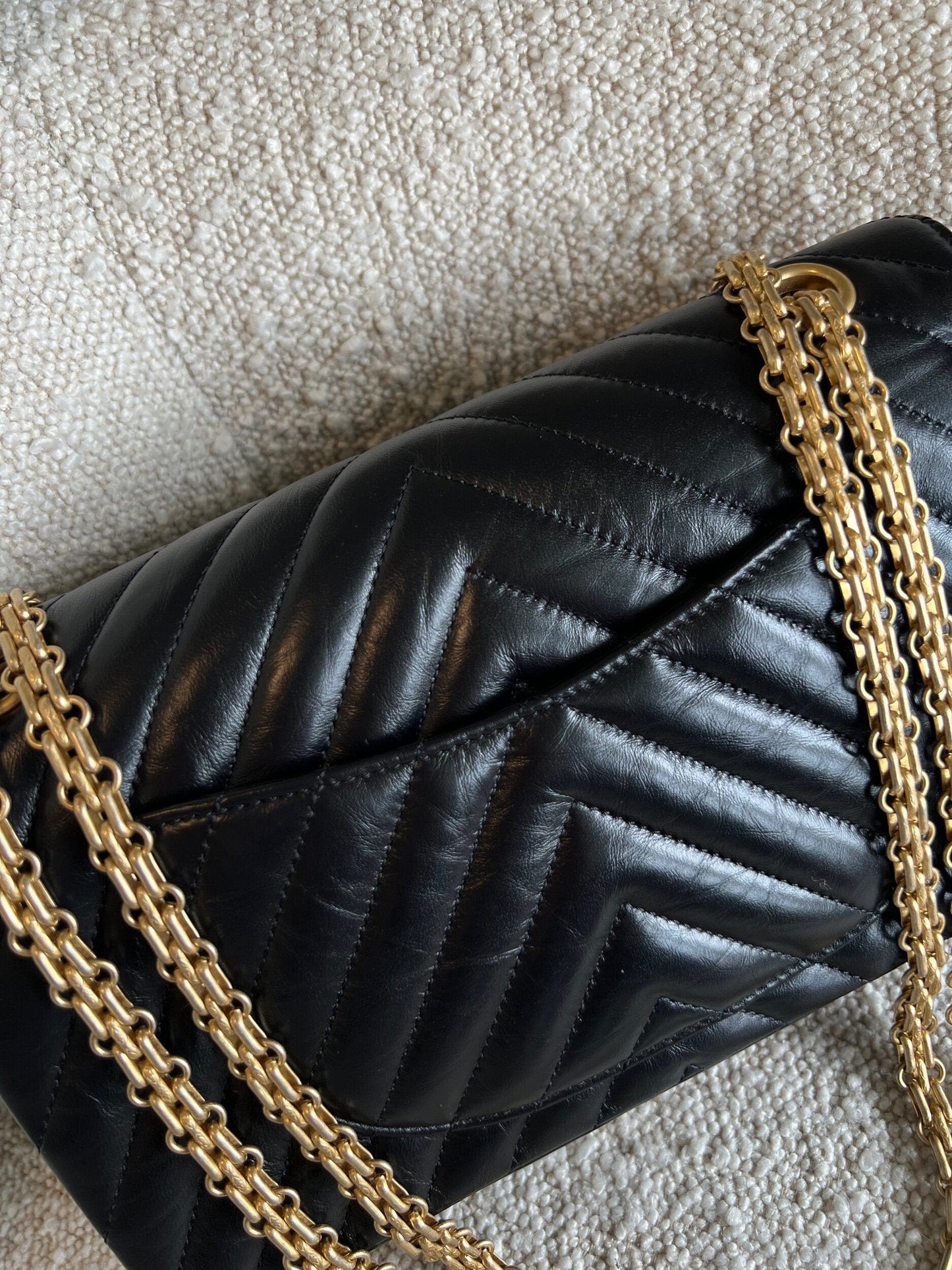 Chanel 21K Reissue 2.55 Black Chevron Aged Calfskin Quilted 225 (Medium) AGHW