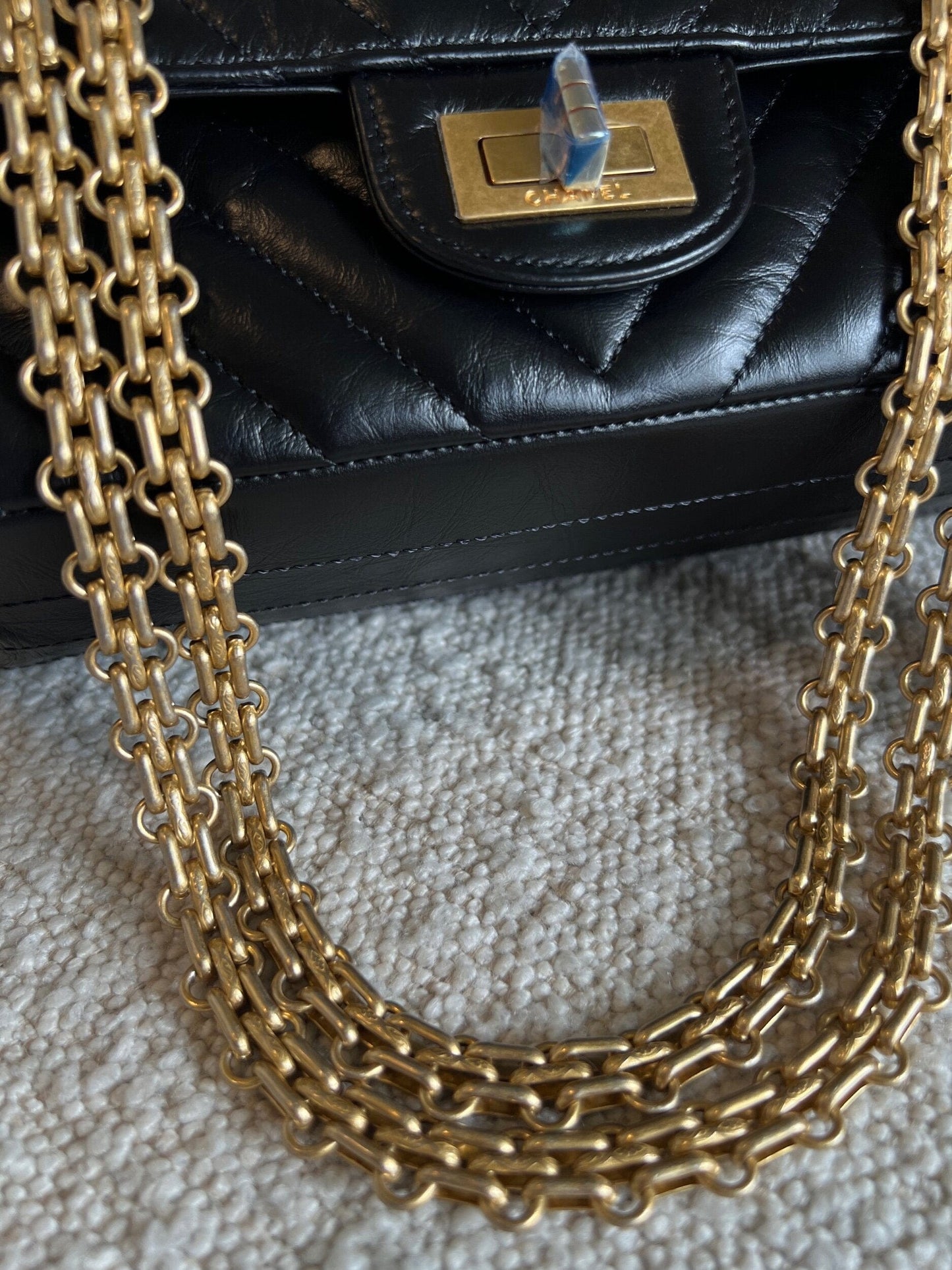 Chanel 21K Reissue 2.55 Black Chevron Aged Calfskin Quilted 225 (Medium) AGHW