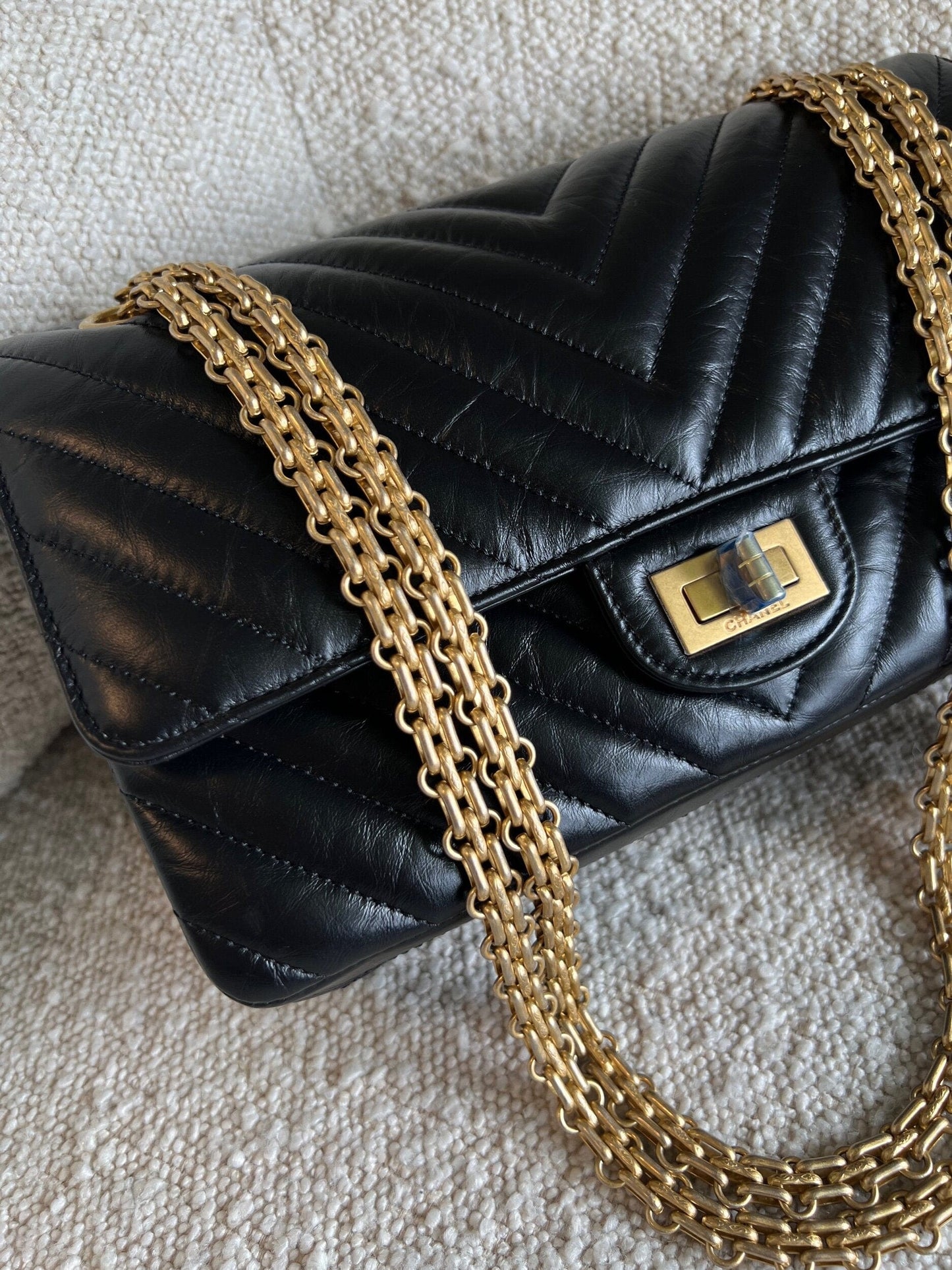 Chanel 21K Reissue 2.55 Black Chevron Aged Calfskin Quilted 225 (Medium) AGHW