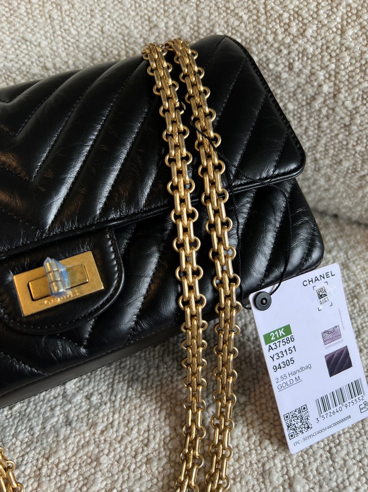 Chanel 21K Reissue 2.55 Black Chevron Aged Calfskin Quilted 225 (Medium) AGHW