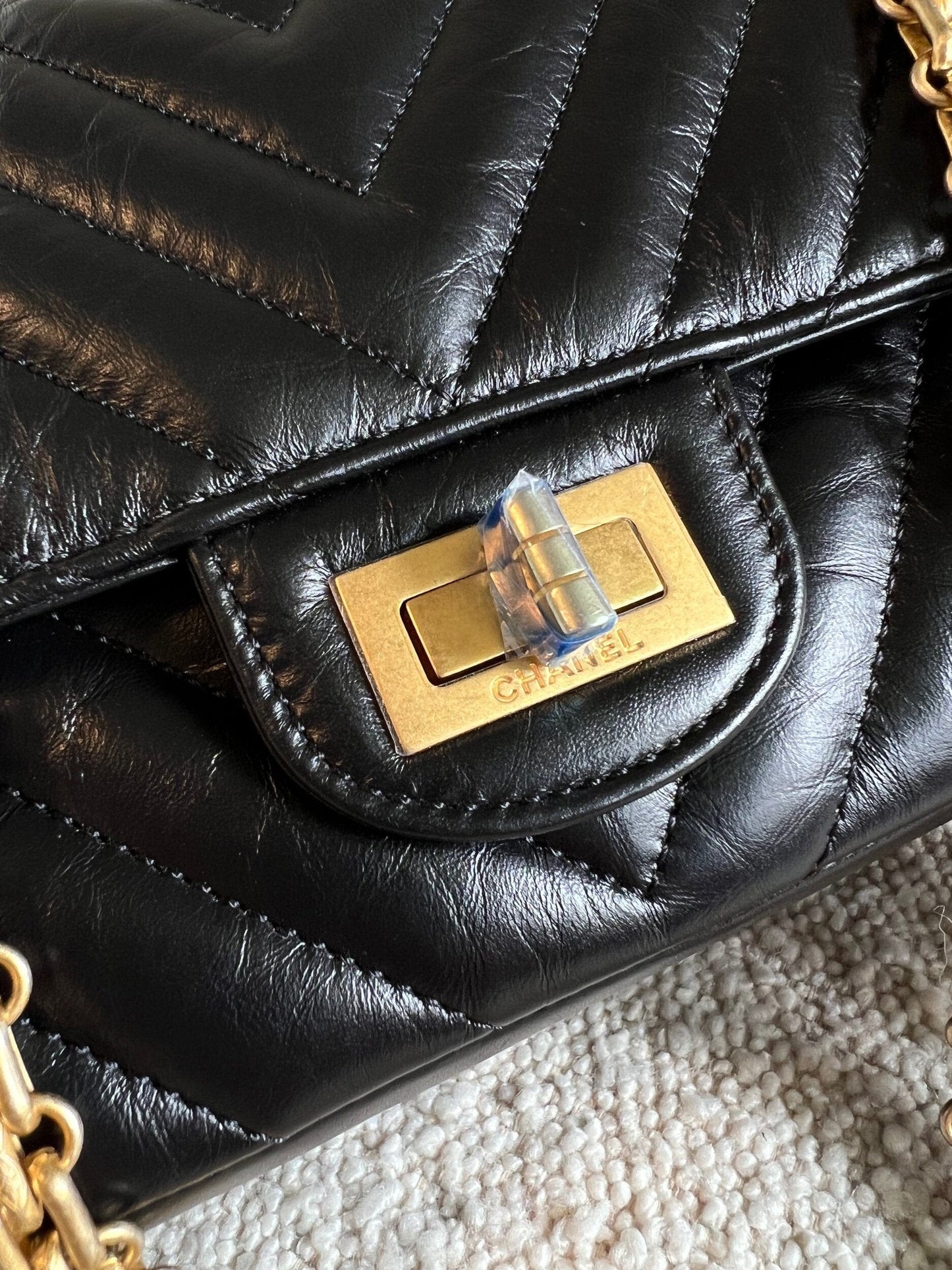 Chanel 21K Reissue 2.55 Black Chevron Aged Calfskin Quilted 225 (Medium) AGHW