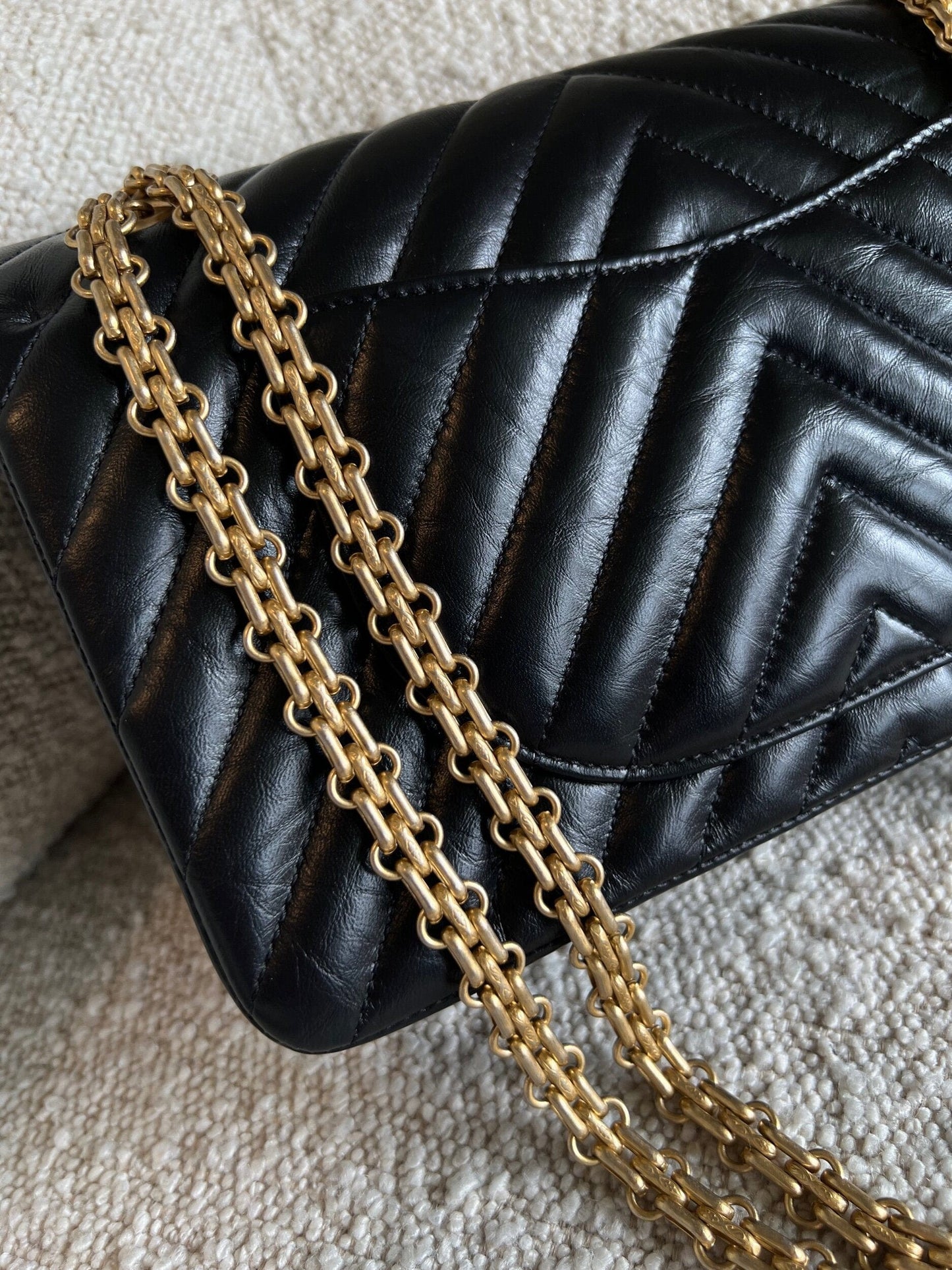 Chanel 21K Reissue 2.55 Black Chevron Aged Calfskin Quilted 225 (Medium) AGHW