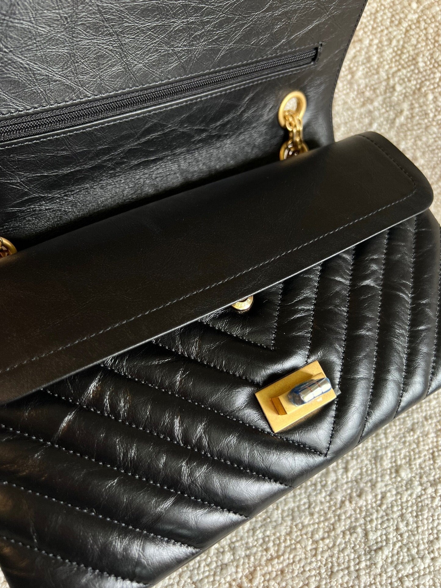 Chanel 21K Reissue 2.55 Black Chevron Aged Calfskin Quilted 225 (Medium) AGHW