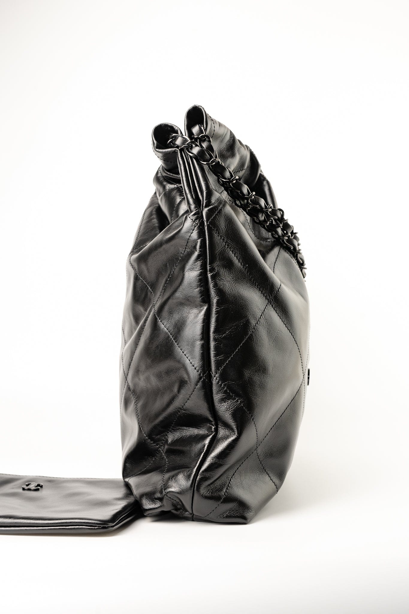 So Black Calfskin Quilted Drawstring 22 Bag medium Black Hardware