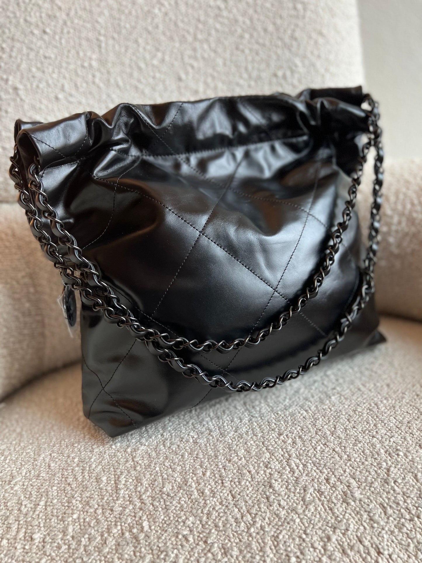 So Black Calfskin Quilted Drawstring 22 Bag small Black Hardware