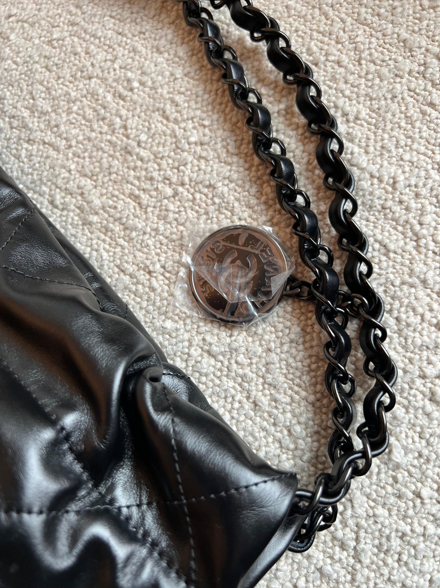 So Black Calfskin Quilted Drawstring 22 Bag small Black Hardware