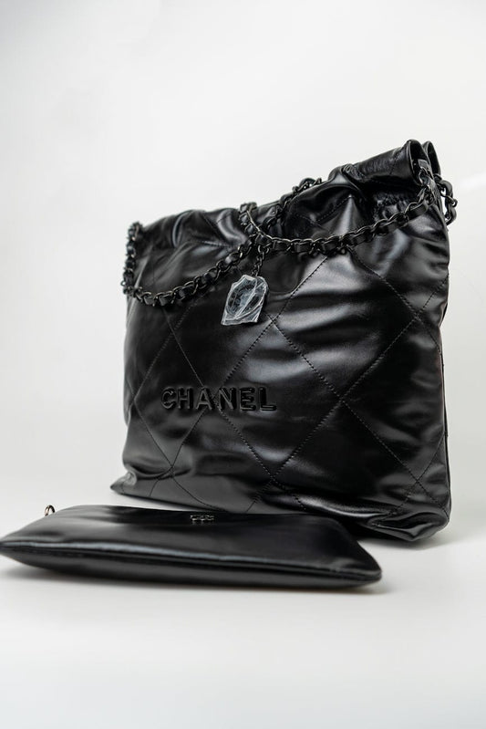 So Black Calfskin Quilted Drawstring 22 Bag small Black Hardware