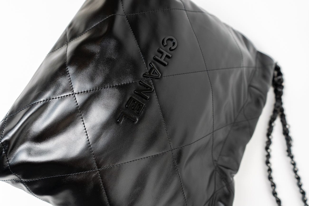 So Black Calfskin Quilted Drawstring 22 Bag small Black Hardware