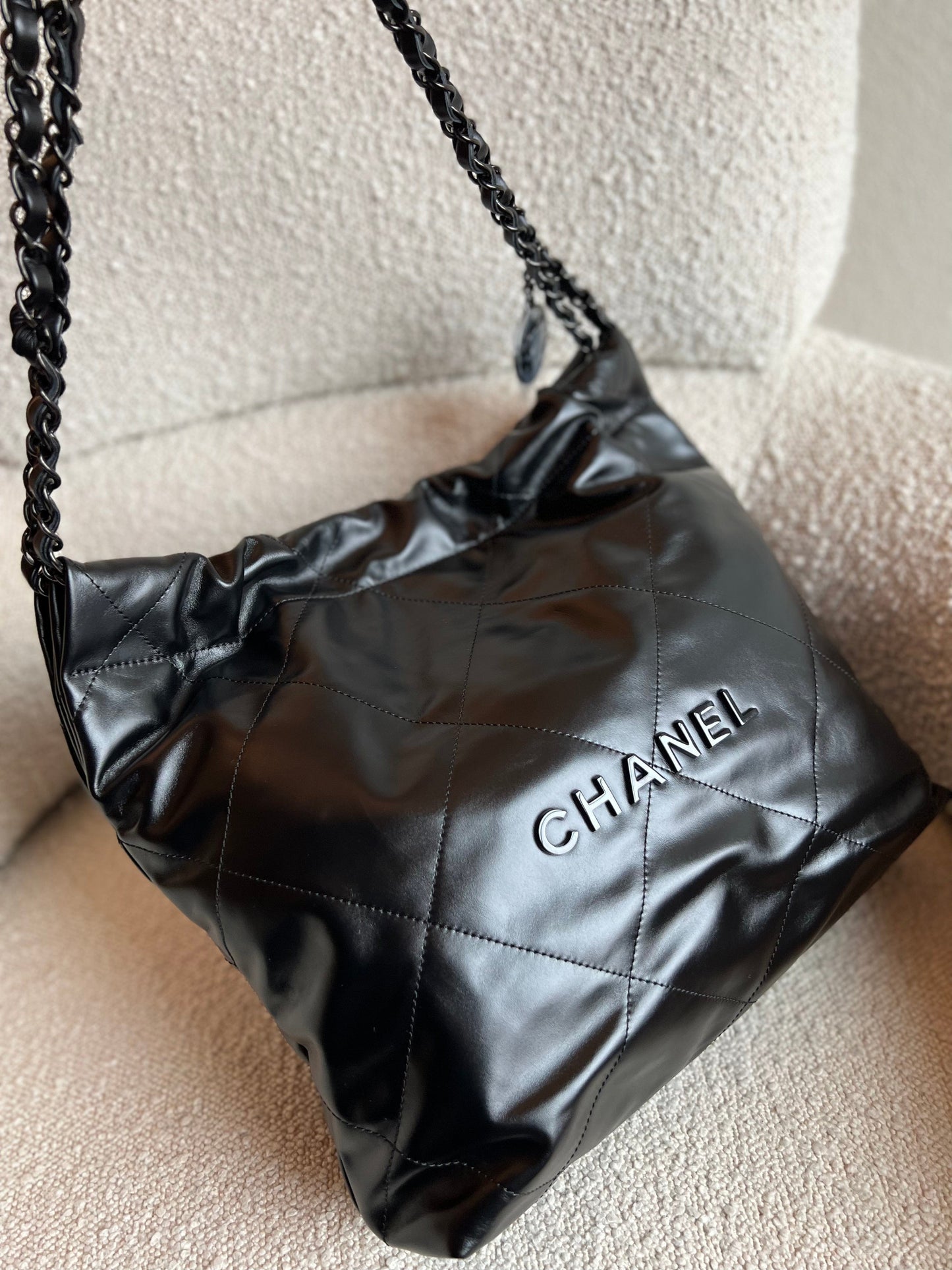 So Black Calfskin Quilted Drawstring 22 Bag small Black Hardware